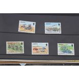 A collection of 140 packs of Jersey special issue mint stamps, circa 1974-96, in four albums; & a