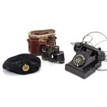 A 1960’s black Bakelite telephone; a pair of Dollond’s “Standard” binoculars, with case; & a British