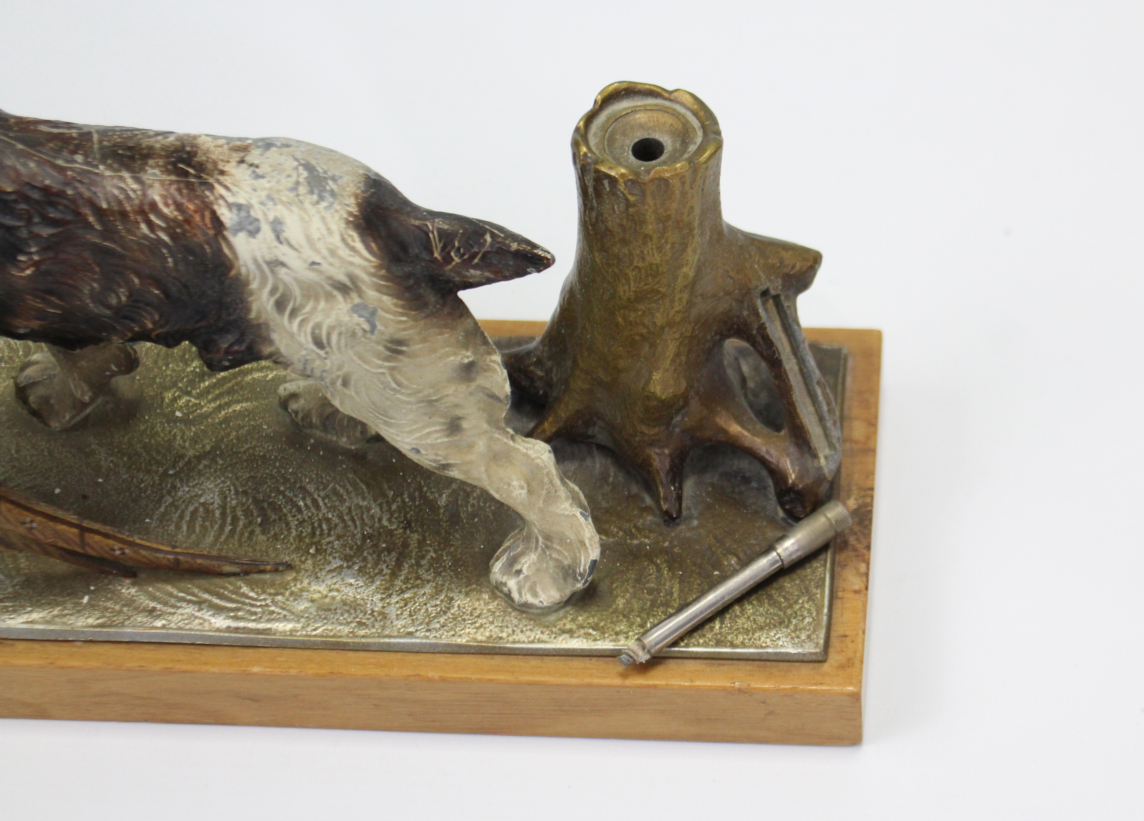 A painted-metal novelty match-striker in the form of a standing hunting dog with pheasant in its - Image 2 of 4
