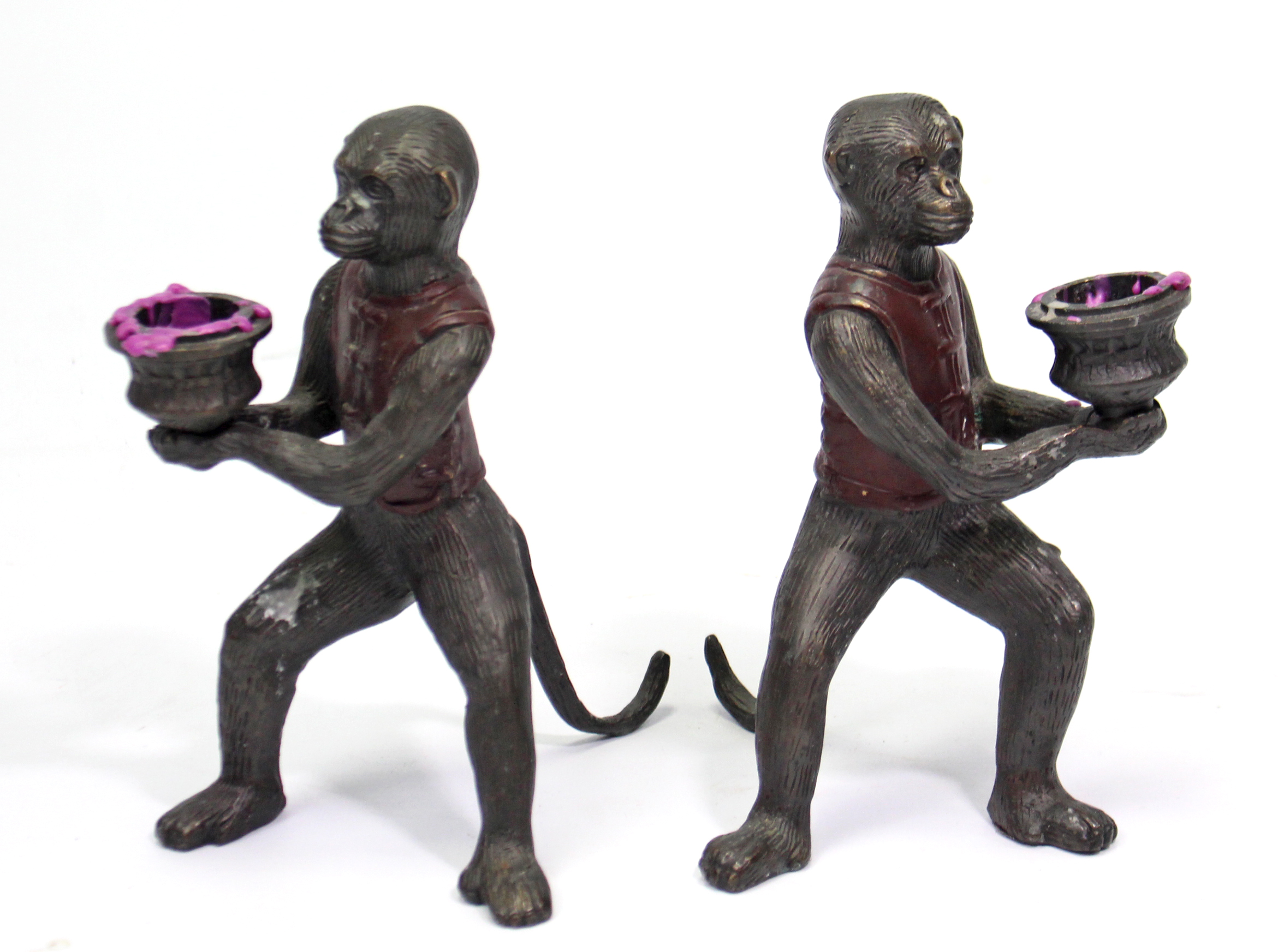 A pair of cold-painted bronzed novelty monkey character candlesticks, 6¾” high.