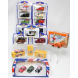 Eighteen various scale model cars, all boxed.