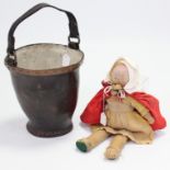 A Lenci-type cloth girl doll, 18½” tall, dressed; & a copper-bound & steel riveted fire bucket, 11½”