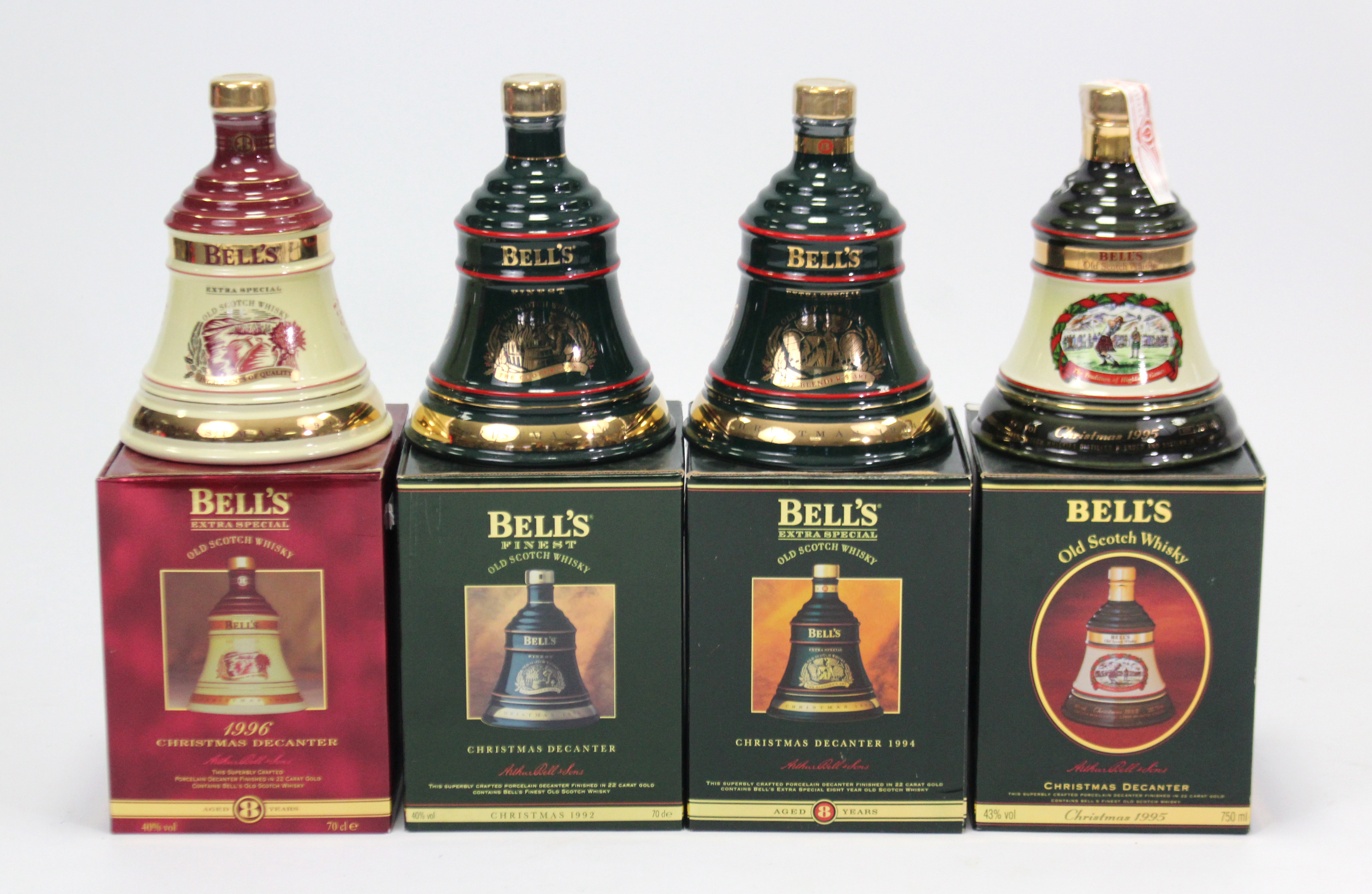 Four Bells old Scotch whisky bell-shaped decanters (Christmas 1992,1994,1995, & 1996), all with