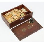 A Chinese mah-jong set, with hardwood box, etc.