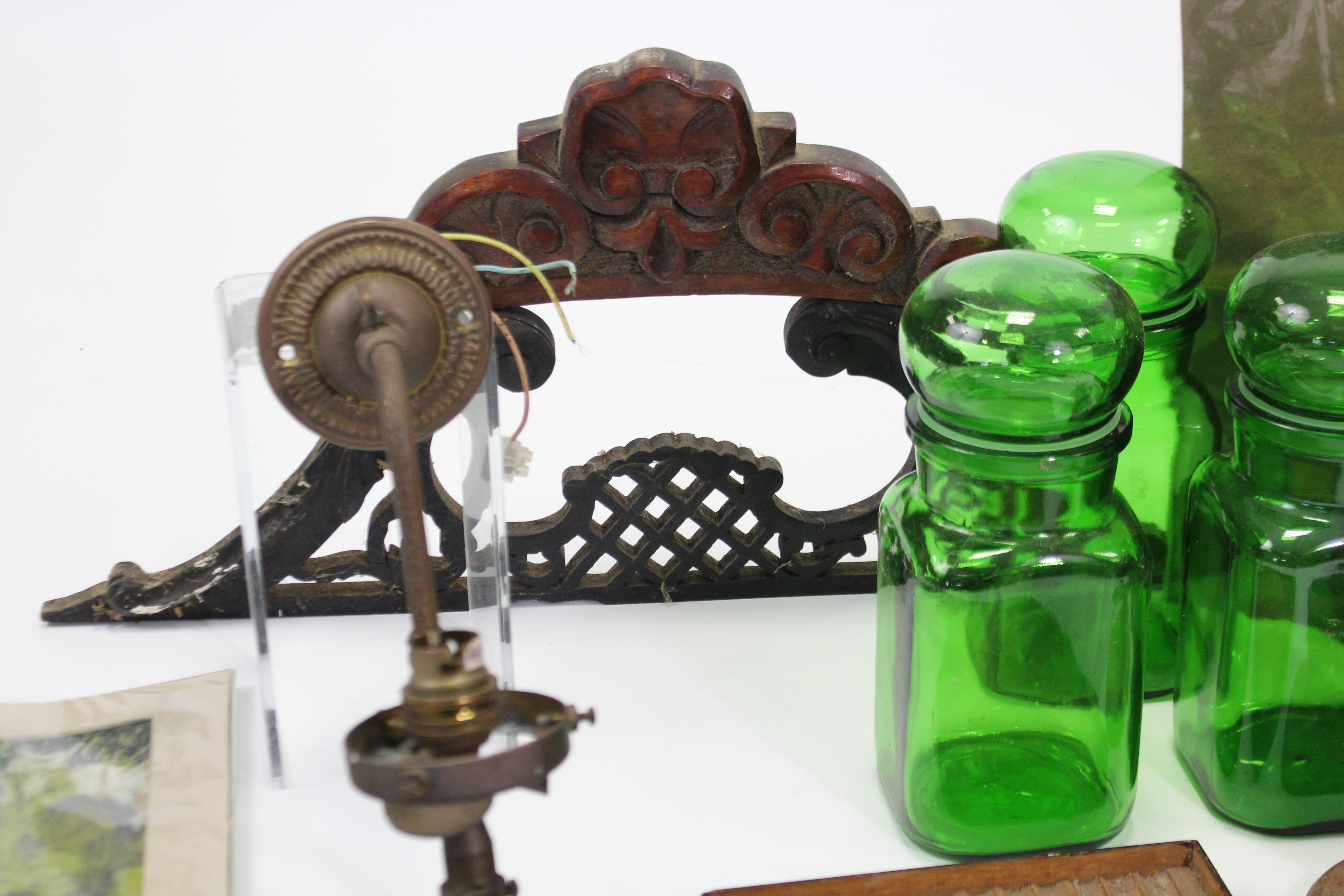 Three green tinted glass storage jars; a “Mazawattee” tea tin; a pair of treen candlesticks; three - Image 2 of 4