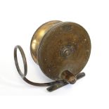 AN ANTIQUE MALLOCH’S PATENT OF PERTH 4¼” DIAMETER SIDE CASTING BRASS FISHING REEL; & a Graham’s of