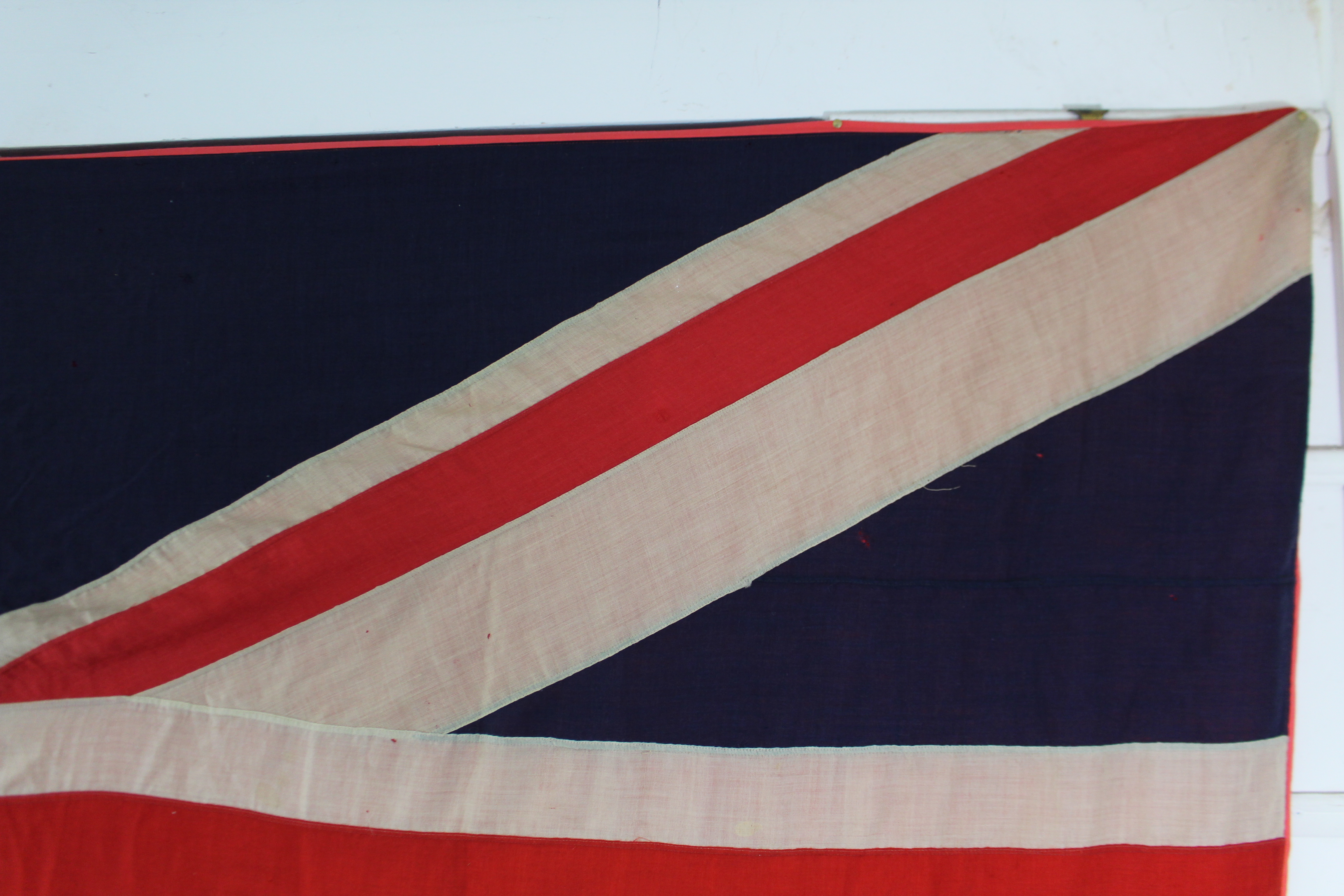 A large Union Jack flag, 68” x 128”. - Image 6 of 6