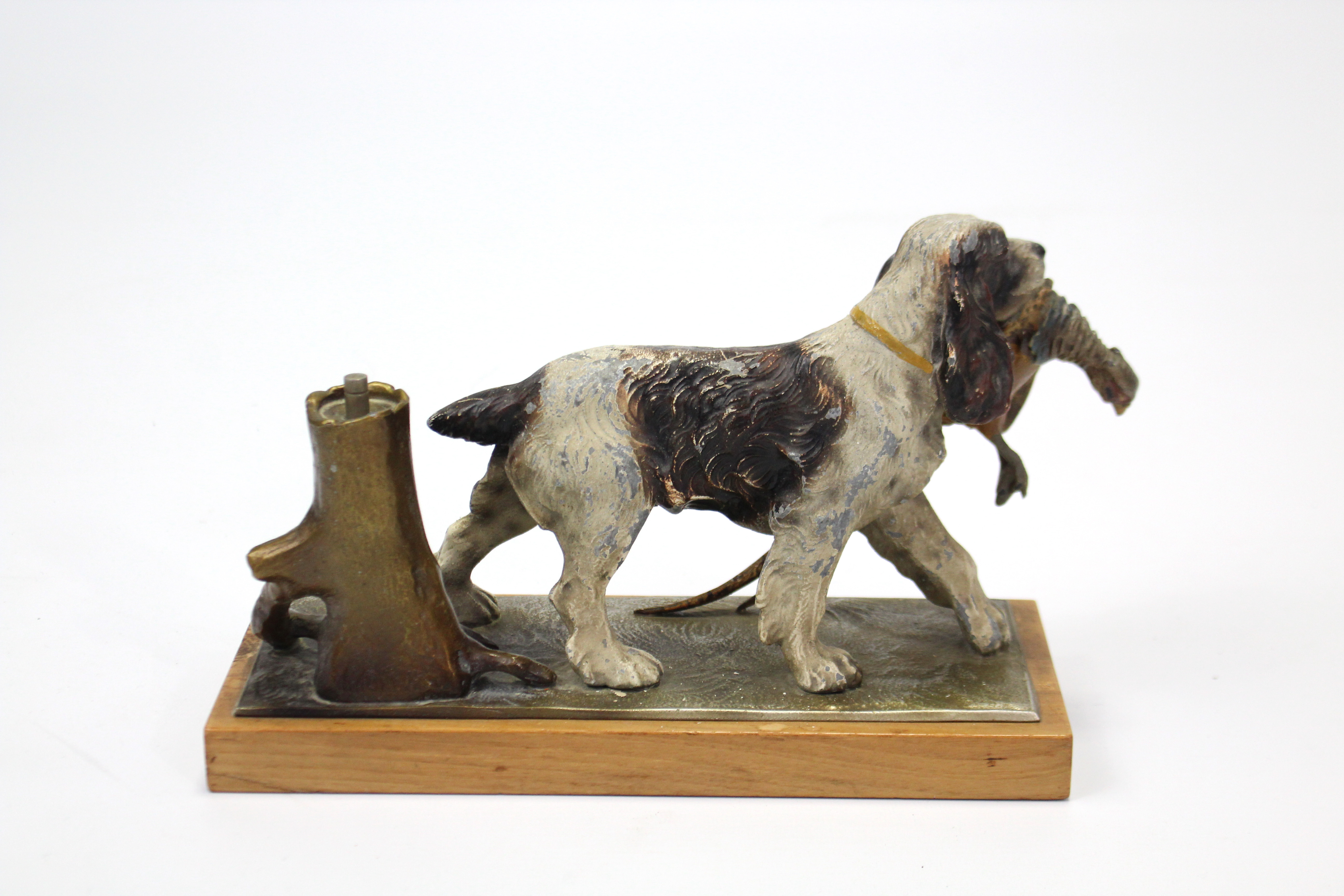 A painted-metal novelty match-striker in the form of a standing hunting dog with pheasant in its - Image 4 of 4