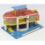 A painted wooden model garage, 25” wide, & various boxed games.