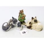 A Beswick Beatrix Potter character figure “Simpkin”; a Royal Doulton ornament in the form of two