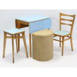 A blue laminate rectangular drop-leaf kitchen table, fitted end drawer & on square tapered legs,