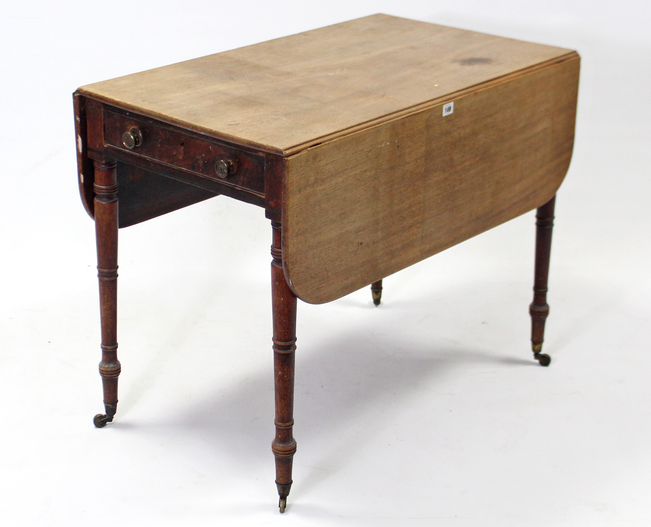 A 19th century mahogany Pembroke table, fitted end drawer & on ring-turned tapered legs with brass