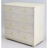 A Victorian white painted pine chest fitted four long graduated drawers with turned knob handles,