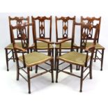 A set of six late 19th century inlaid-beech salon chairs (including a pair of carvers), with