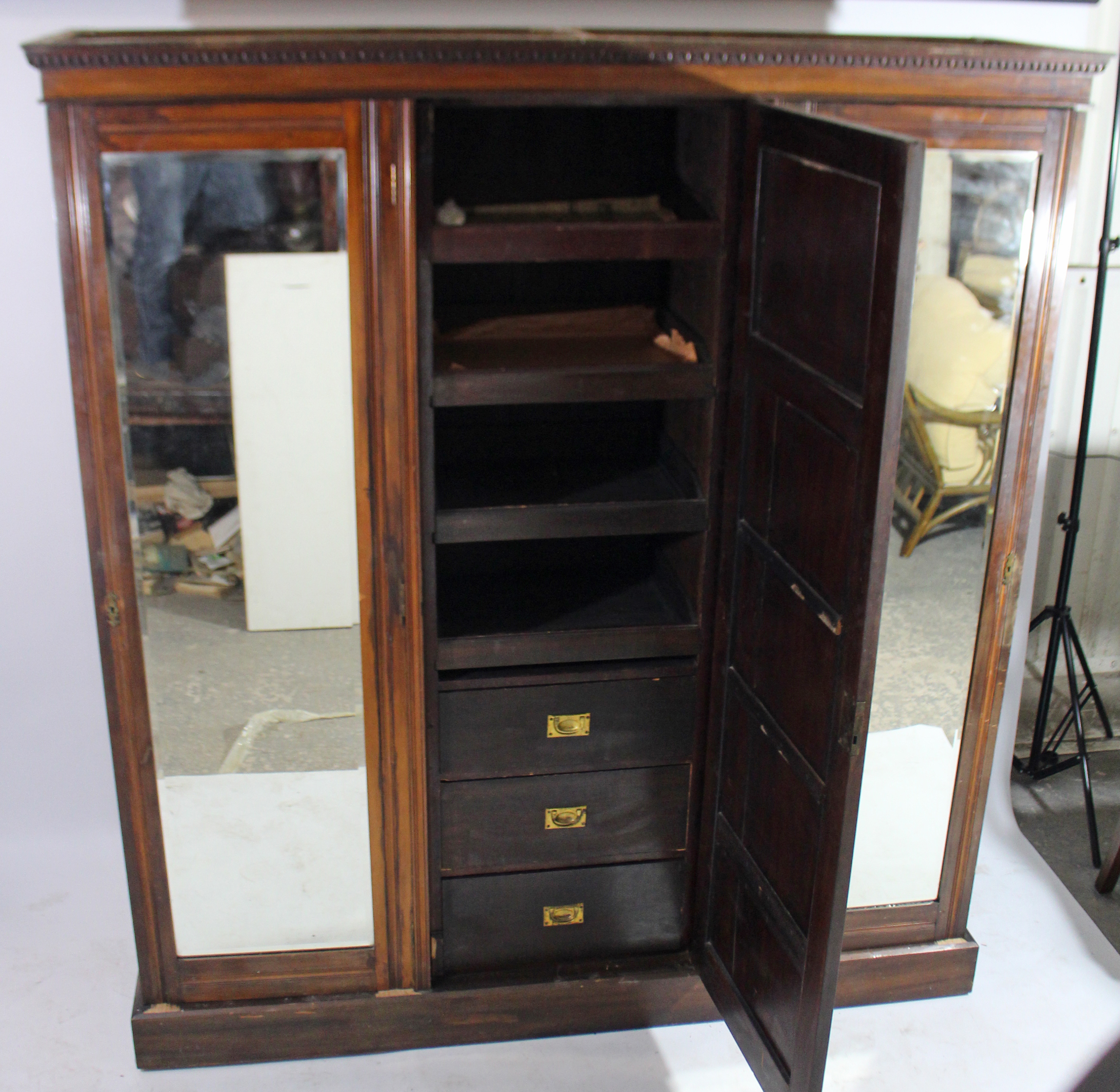 An Edwardian walnut wardrobe with moulded cornice, having fitted interior enclosed by carved panel - Image 3 of 5