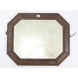 A 1930’s oak frame rectangular wall mirror, 24” x 20”; together with two oval baby’s baths; two