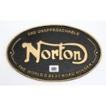 A reproduction painted cast-iron oval sign “NORTON”, 7¾” x 12½”.