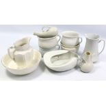 Two white glazed toilet jugs; a ditto toilet jug; four white glazed chamber pots, etc.