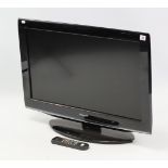 A Toshiba 31” LCD television with remote control.