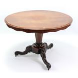 A 19th century mahogany pedestal dining table, with moulded edge to the circular tilt-top, & on