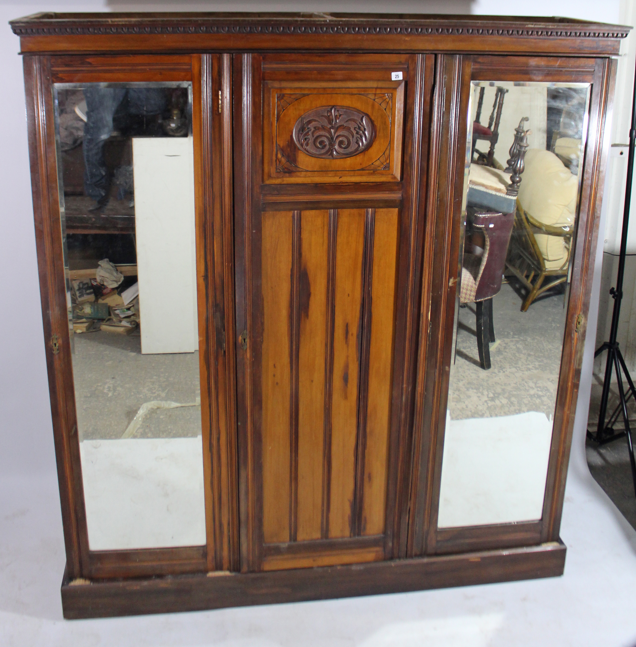 An Edwardian walnut wardrobe with moulded cornice, having fitted interior enclosed by carved panel - Image 2 of 5