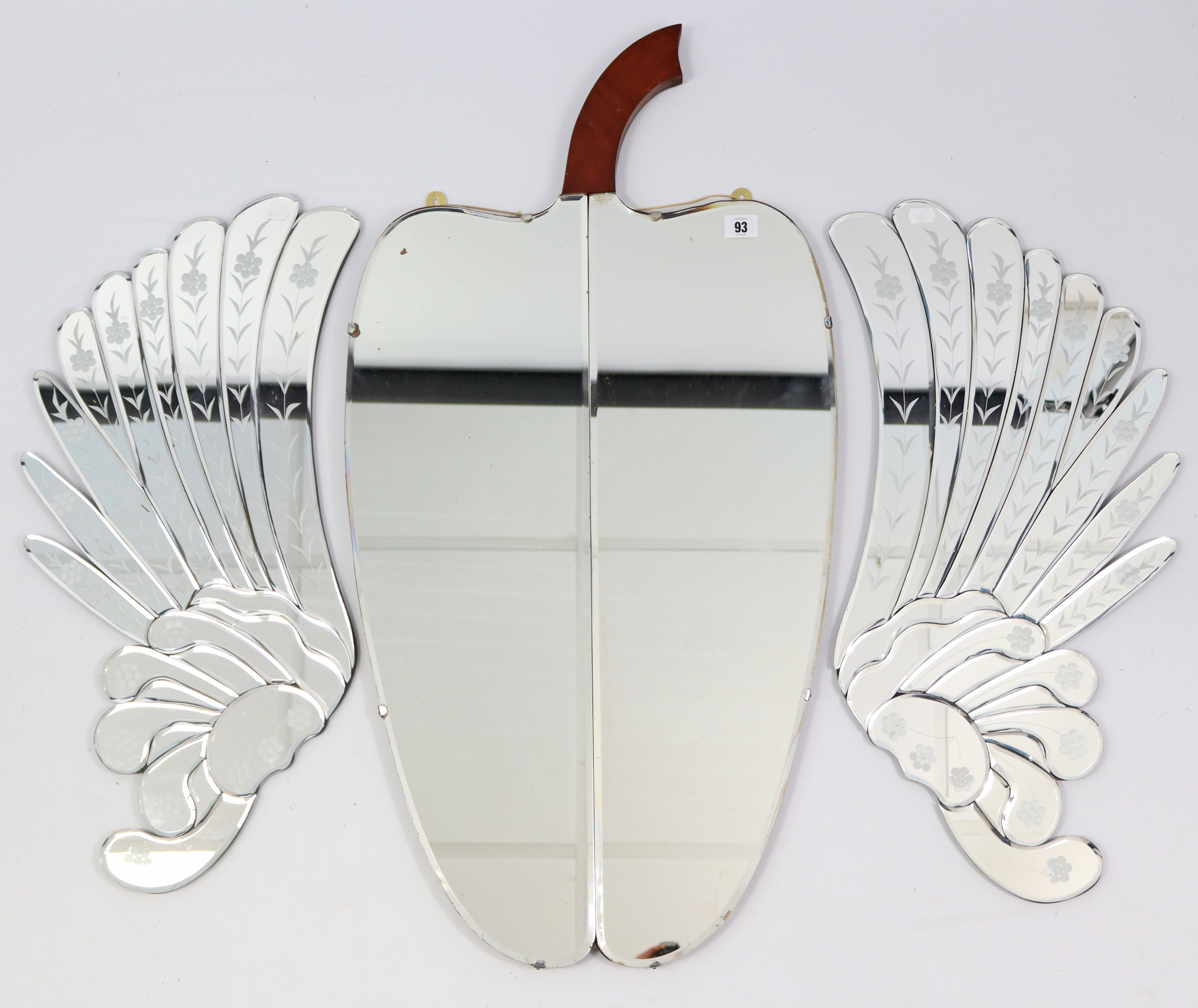 A novelty wall mirror in the form of an apple & with bevelled plate, 35” x 18”; & a pair of