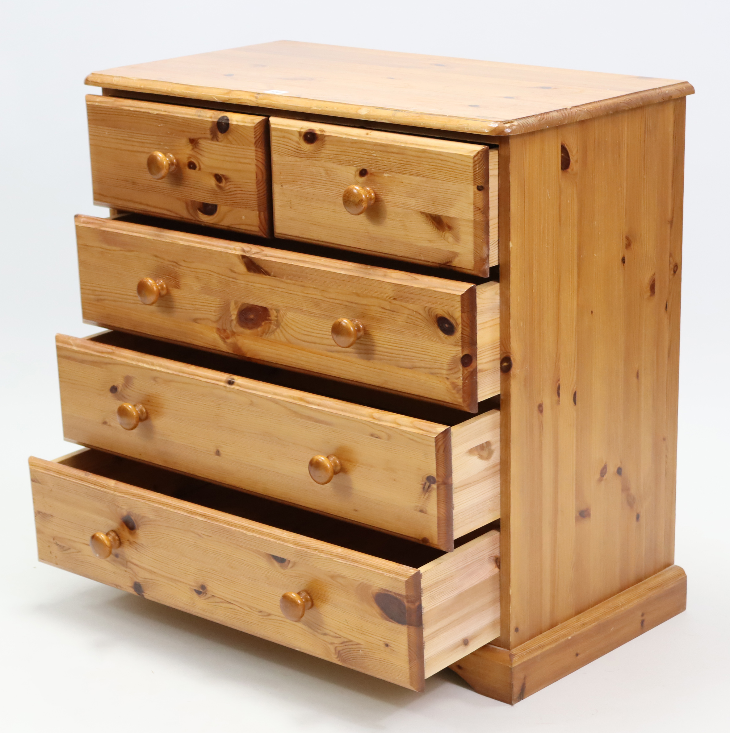 A pine small chest, fitted two short & three long drawers with turned knob handles, & on shaped - Image 2 of 2