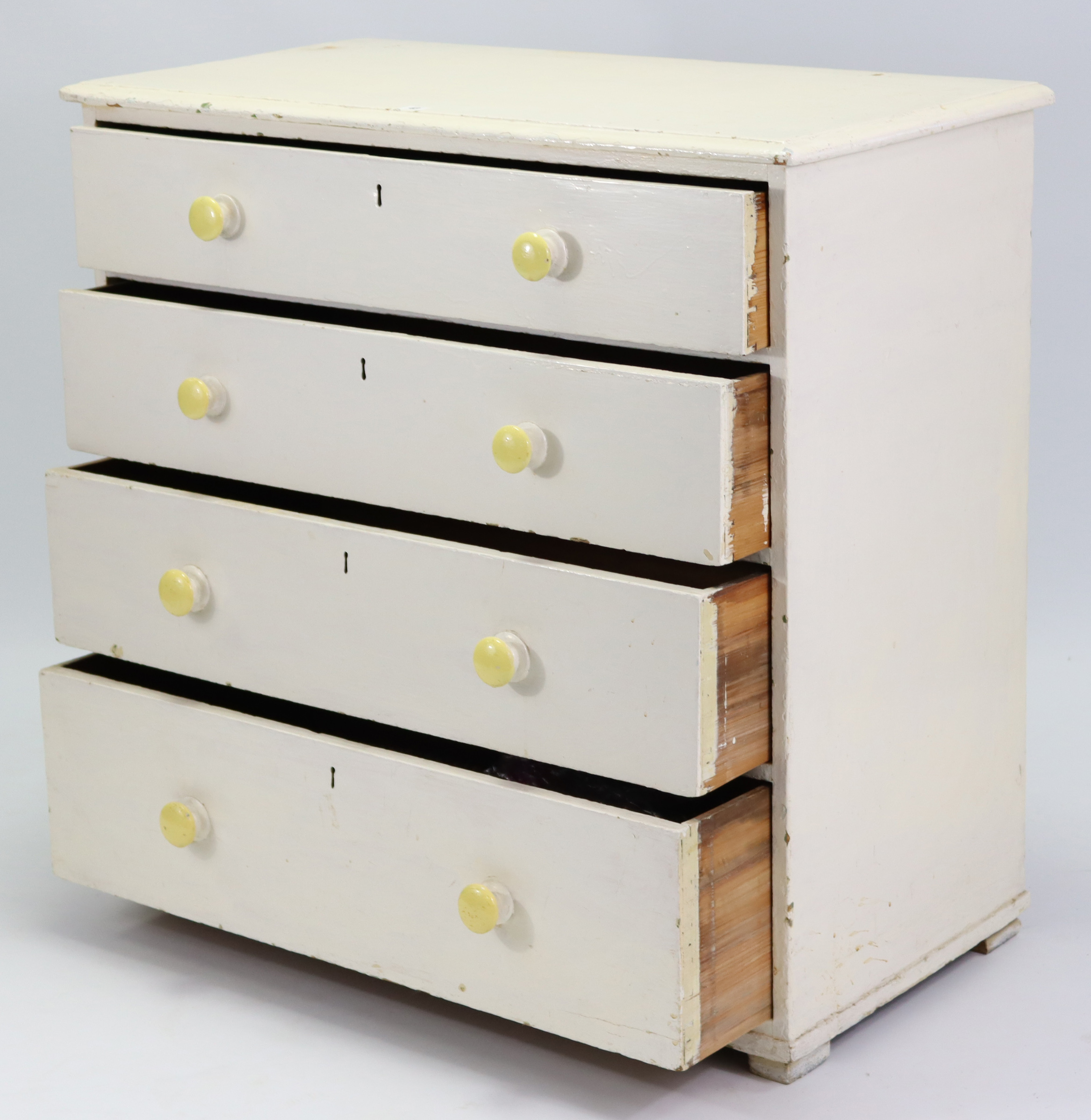 A Victorian white painted pine chest fitted four long graduated drawers with turned knob handles, - Image 2 of 2