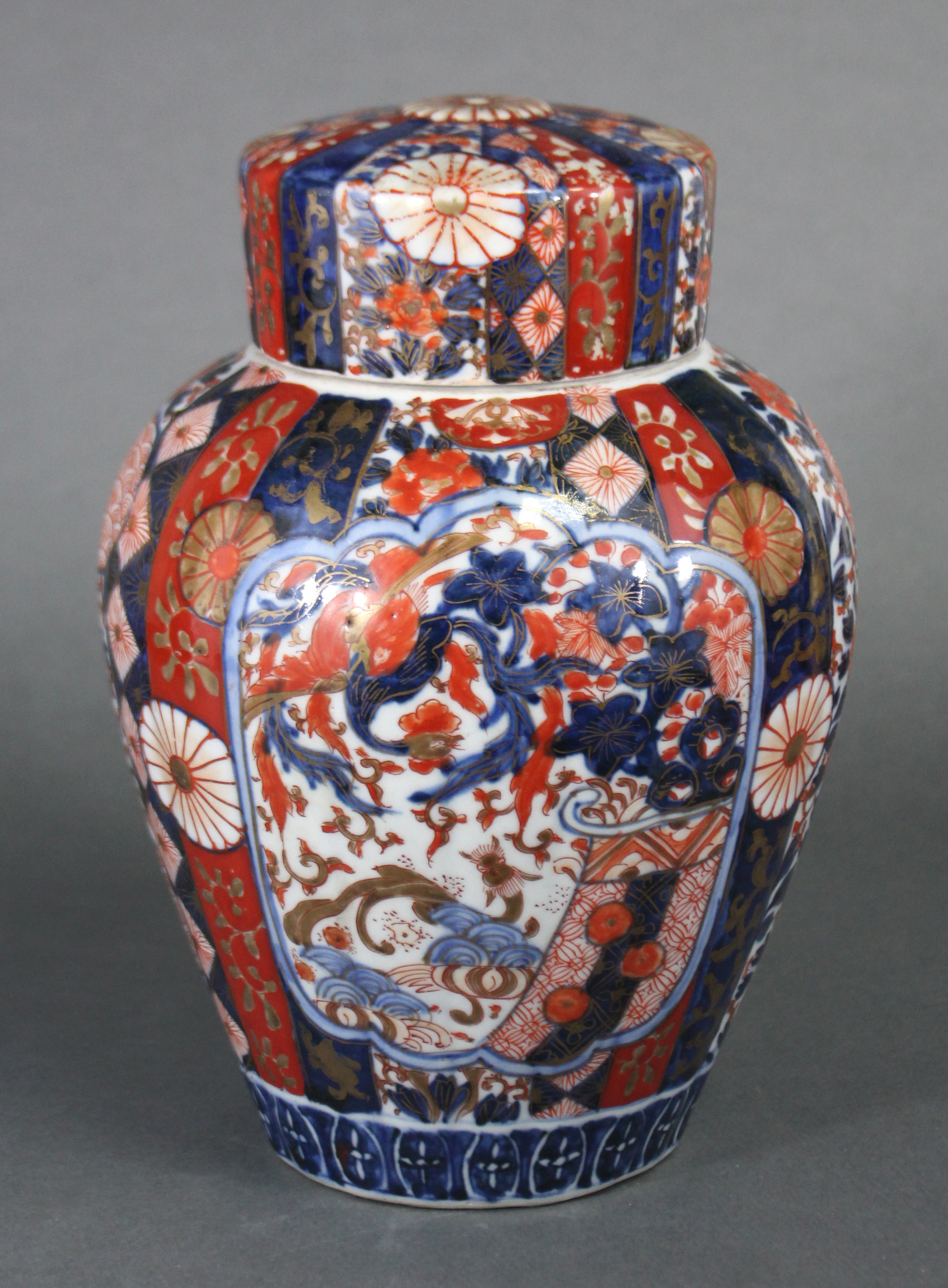 A 19th century Japanese Imari ginger jar & cover, the fluted ovoid body decorated with foliage & - Image 3 of 5