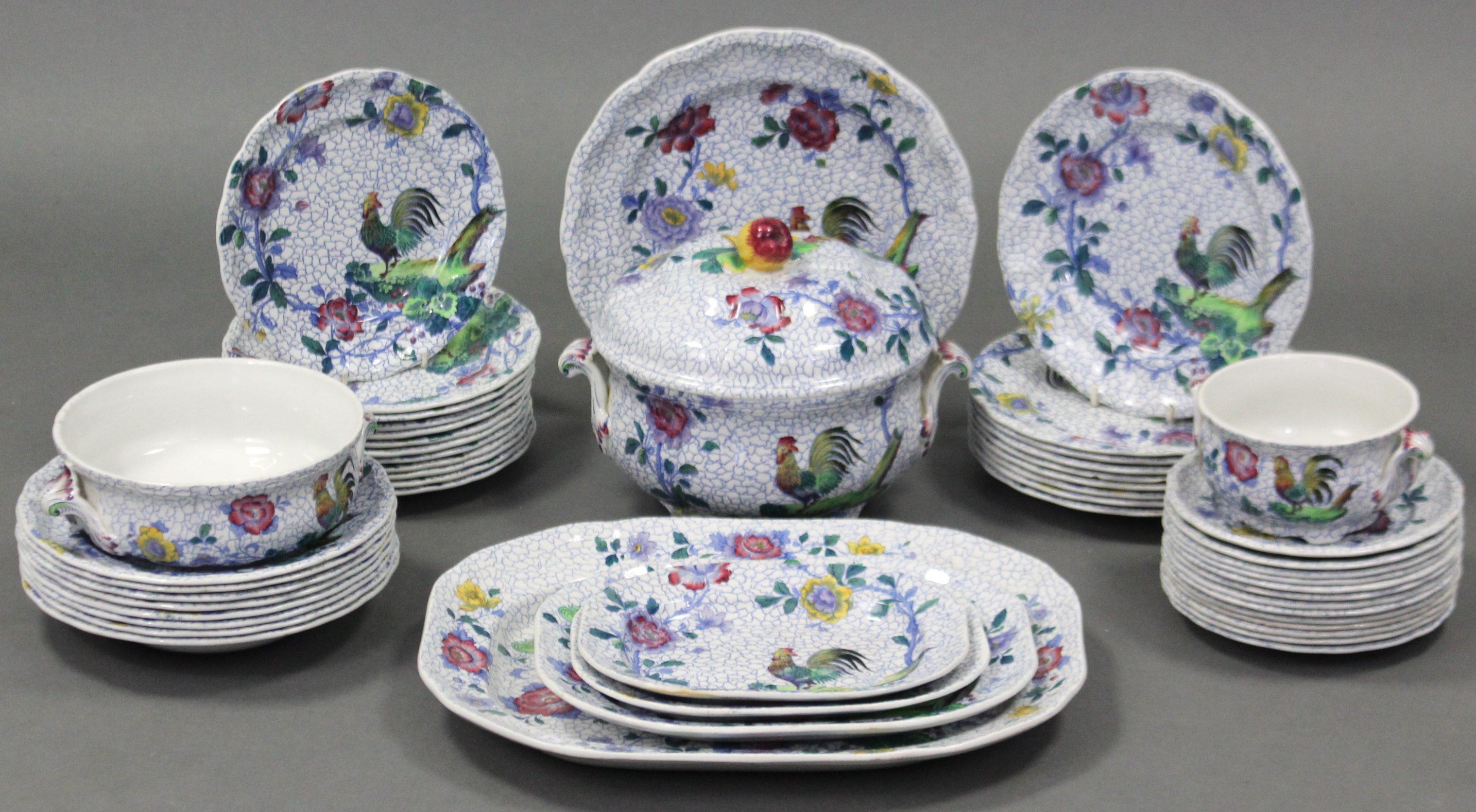 A late 19th century Copeland Spode “Chanticleer” pattern fifty-piece part dinner service, comprising