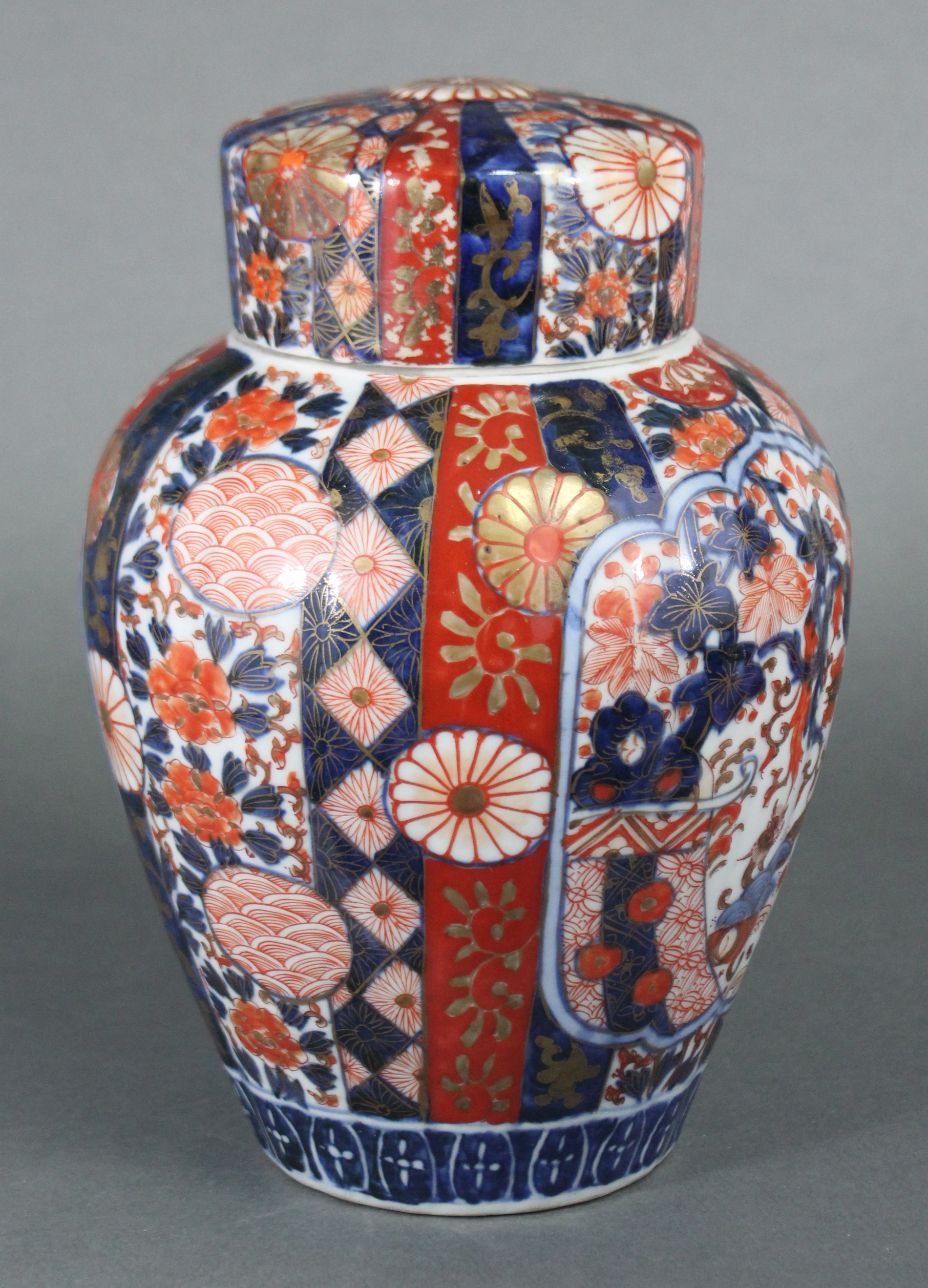 A 19th century Japanese Imari ginger jar & cover, the fluted ovoid body decorated with foliage & - Image 2 of 5