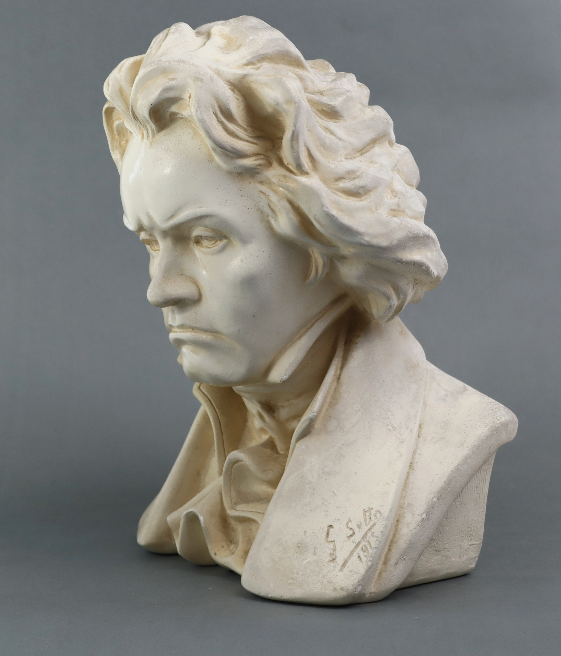 A white painted plaster bust of Beethoven, incised to base “G. Setto 1915”; 10­½” wide x 14½” high. - Image 2 of 2