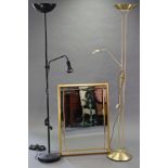 A gilt frame rectangular wall mirror, 35” x 24¾”; & two standard uplighters.