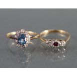 A 9ct. gold & platinum ring set small ruby with a tiny diamond either side; Size: O; weight 1.6gm; &