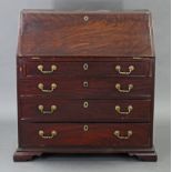 An 18th century mahogany bureau, the fitted interior enclosed by fall front above four long