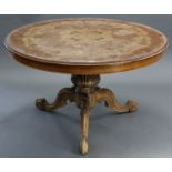 A Victorian-style marquetry-inlaid pedestal table with circular tilt-top, & on carved vase-turned