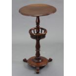 A 19th century mahogany occasional table, the circular top with moulded edge & on baluster turned