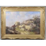 ENGLISH SCHOOL, 19th century. A group of sheep resting on a rocky hilltop. Oil on canvas: 36” x