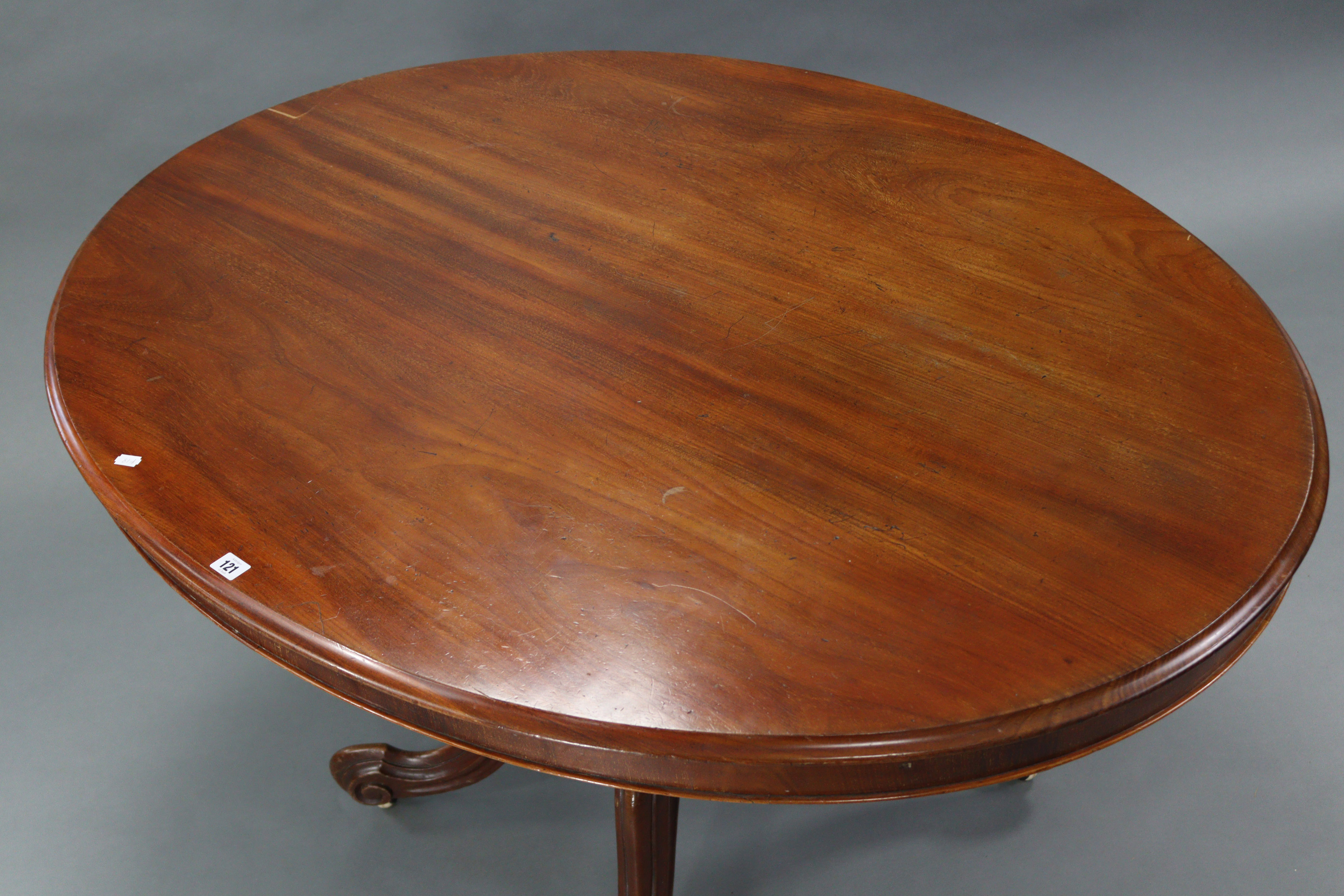 A mid-Victorian mahogany tilt-top oval centre table, with moulded edge, on bulbous carved centre - Image 2 of 3