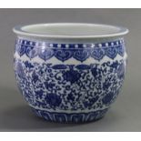 A 19th century Chinese blue & white porcelain round jardinière painted with a formal scrolling