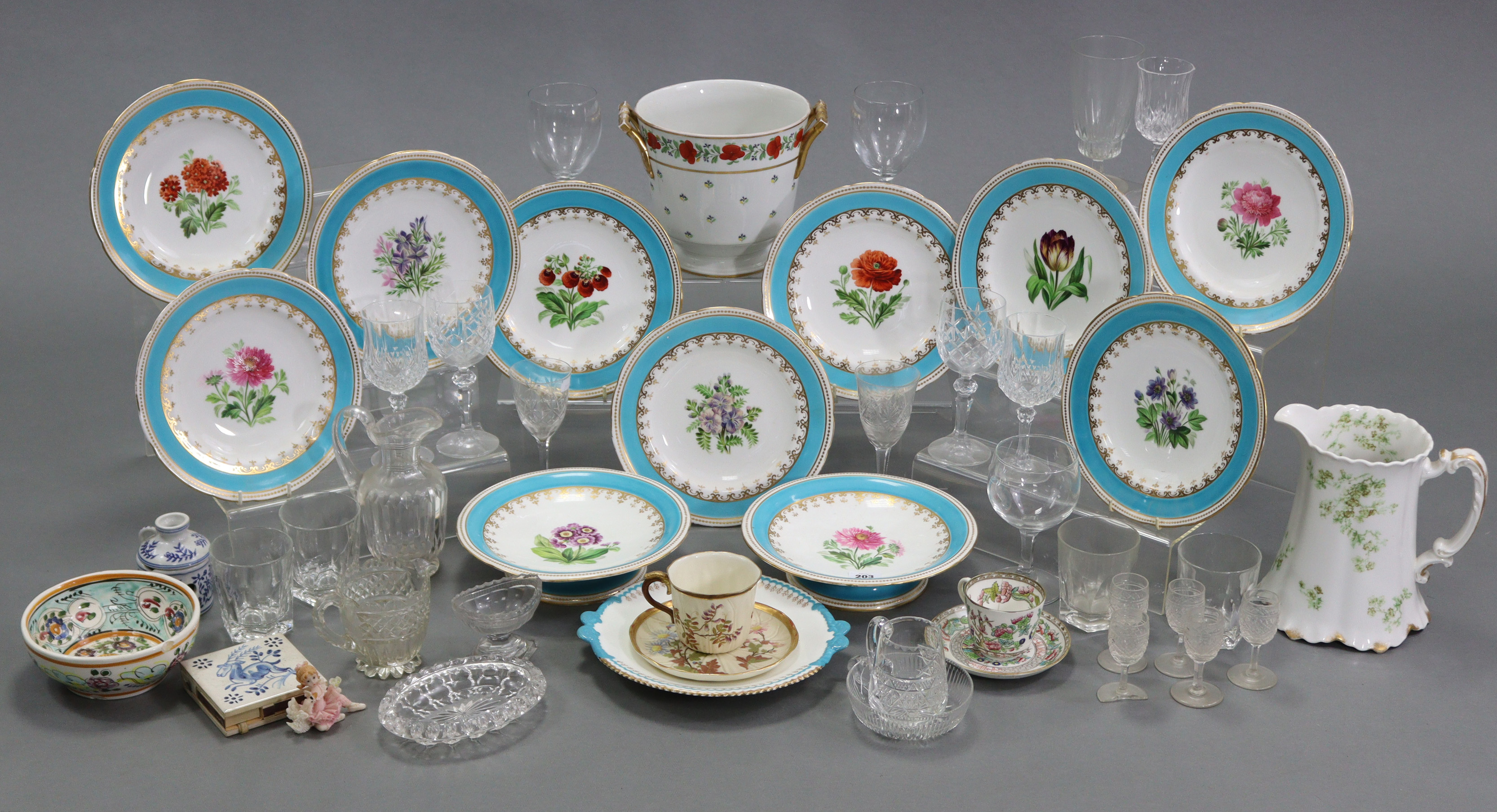 A Victorian porcelain eleven-piece part dessert service, comprising a pair of comports & a set of