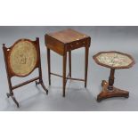 A regency mahogany drop-leaf work table, fitted frieze drawer above a brushing slide, on square