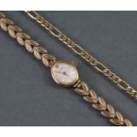 An Accurist 9ct. gold ladies’ wristwatch, the oval silvered dial with gold baton numerals & roman