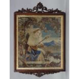 An early Victorian rectangular needlework panel depicting a classical figure scene, in mahogany
