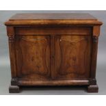 A MID-19th century CONTINENTAL CARVED & FIGURED MAHOGANY CHIFFONIER, the raised