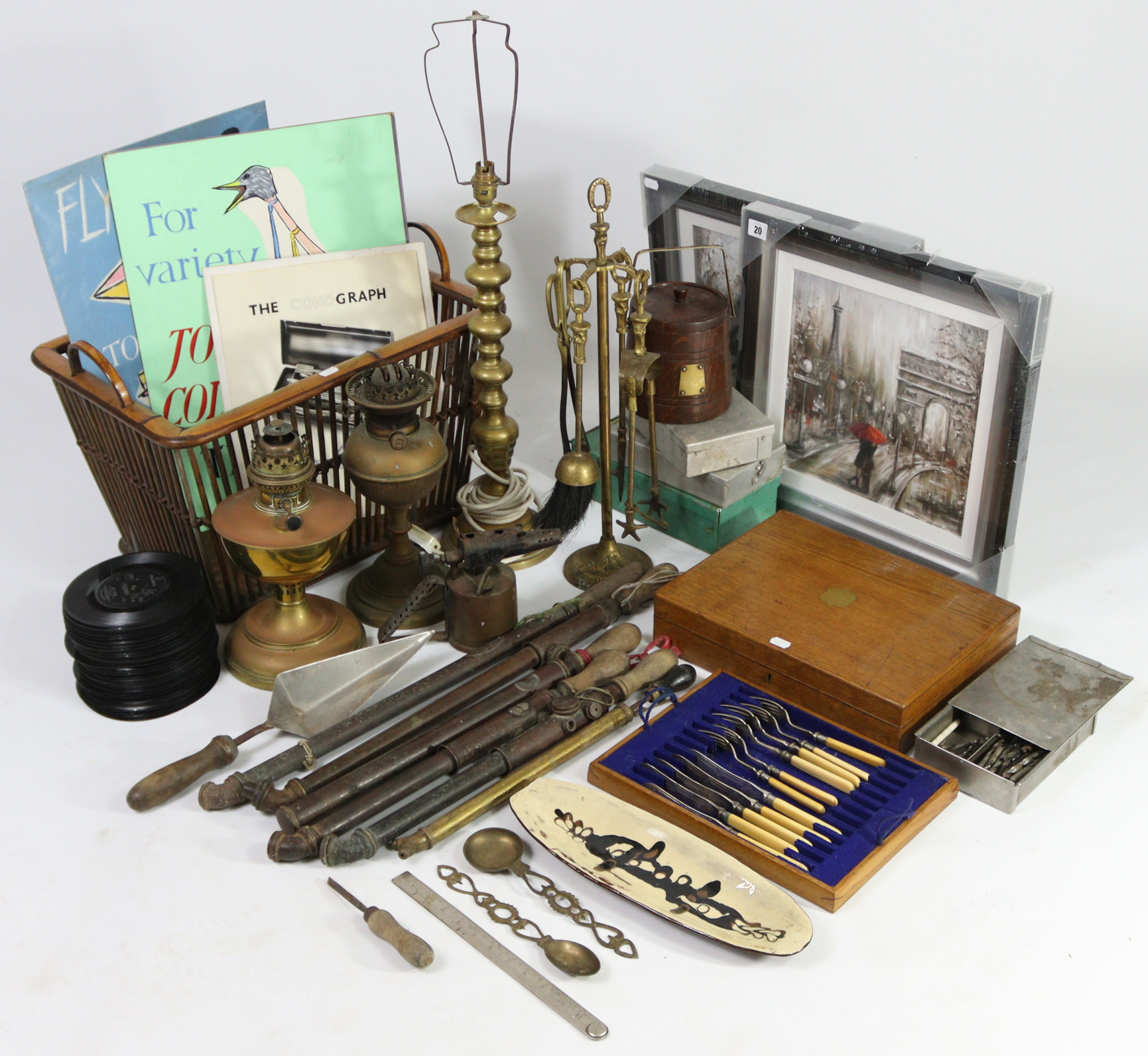 A brass table lamp; two oil table lamps; an oak canteen; various 45 r.p.m. records; various