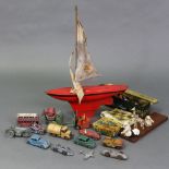 Various die-cast model vehicles, lead animals, a Tri-Ang tinplate model yacht, various other toys