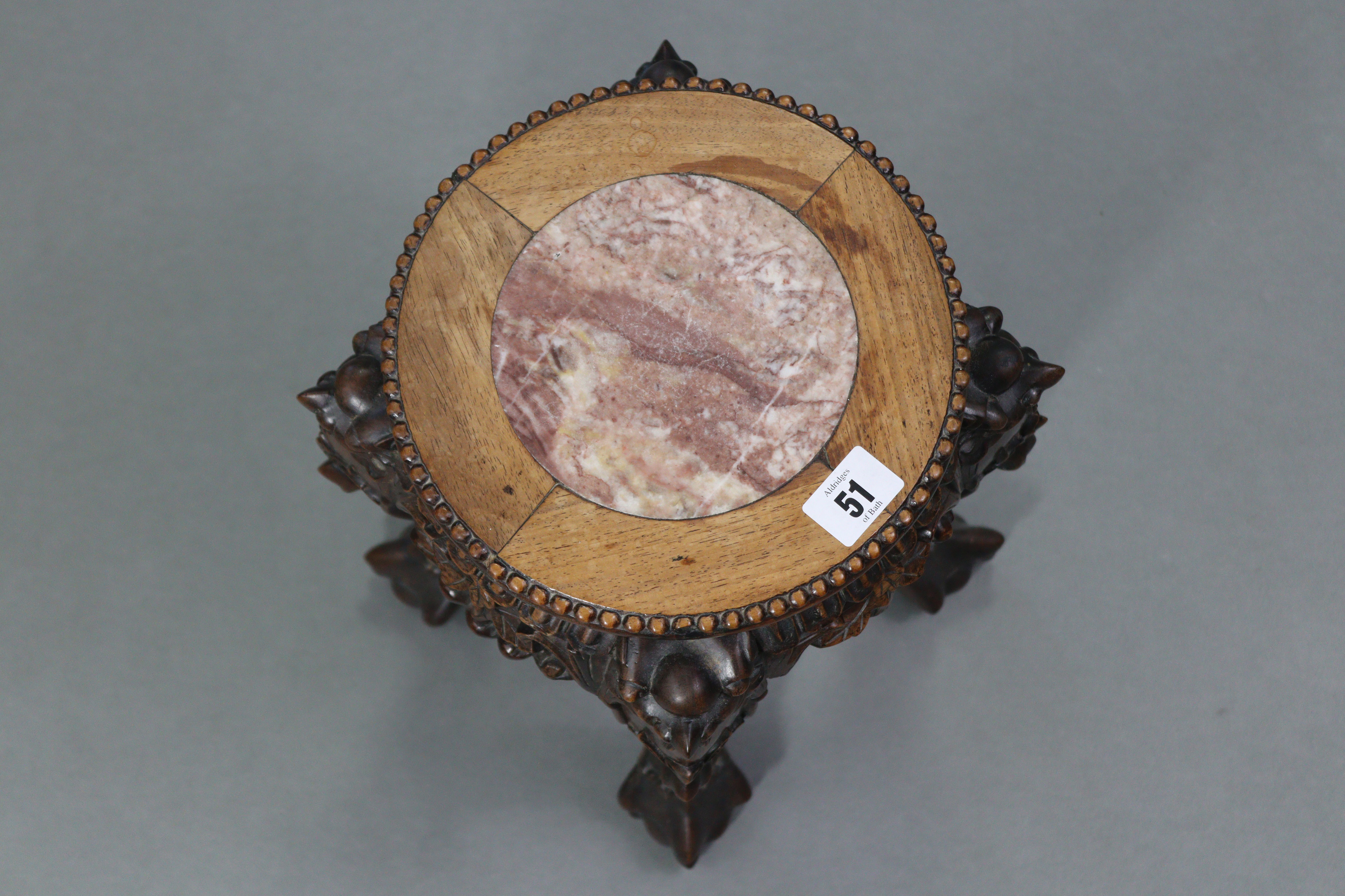 A Chinese-style carved hardwood jardinière stand inset marble to the circular top, & on four - Image 3 of 4