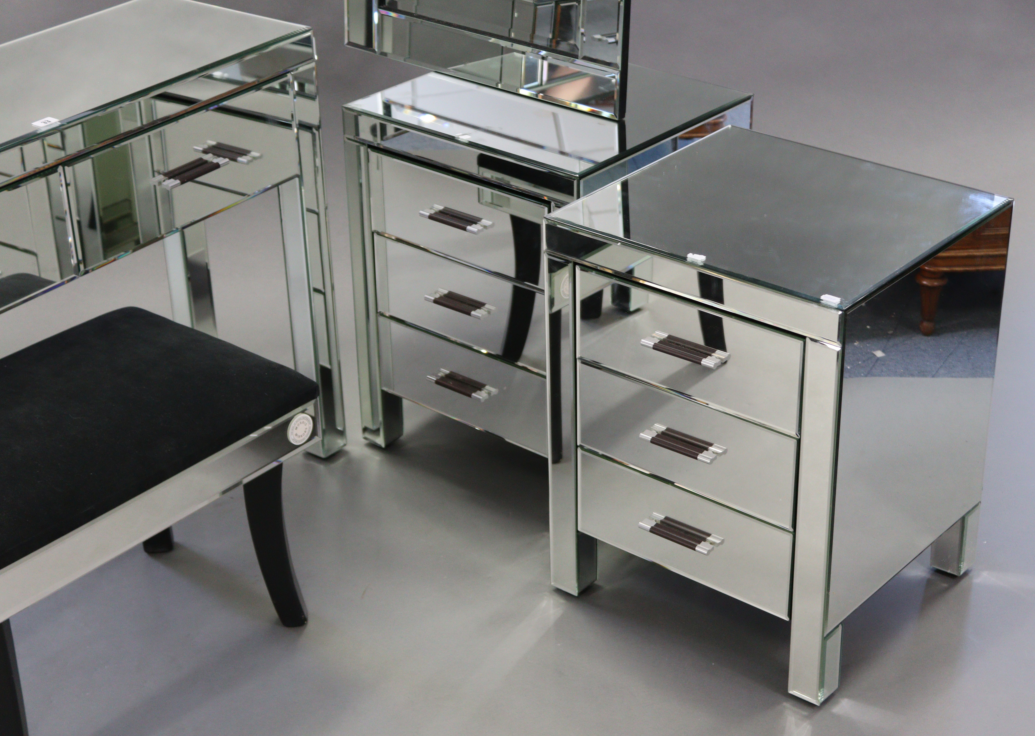 A mirrored four-piece bedroom suite comprising a two-drawer side table, 40½” wide; a pair of three- - Image 6 of 8