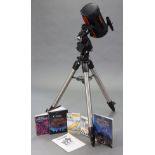 A Celestron “Starbright XLT” telescope with tripod, & various other accessories, books, magazines, &
